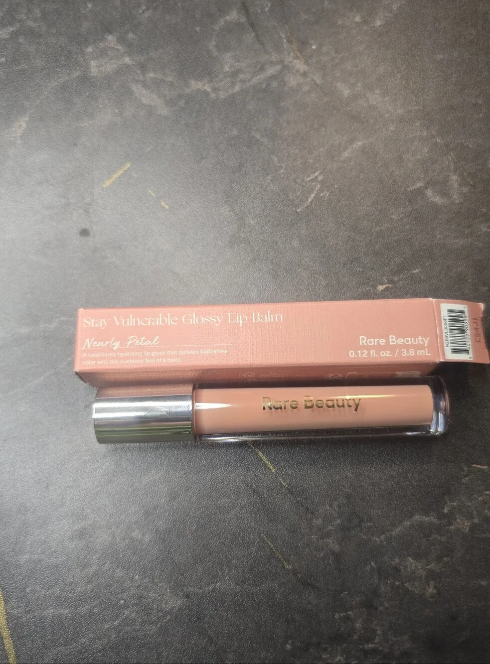 Rare Beauty Stay Vulnerable Glossy Lip Balm in Nearly Petal - Peachy Nude Pink